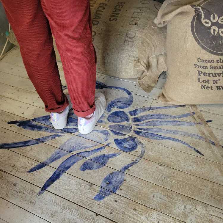 Taos – Floor painting in a chocolate shop.