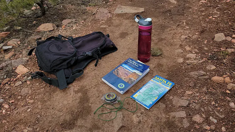 Hiking trails guides and a compass.