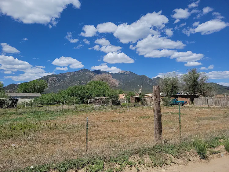 Taos Pueblo — Mountains.