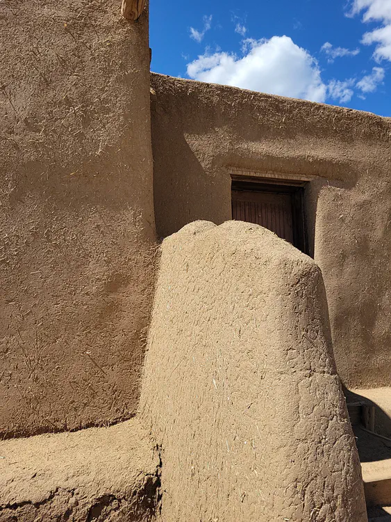 Taos Pueblo — Adobe architecture.