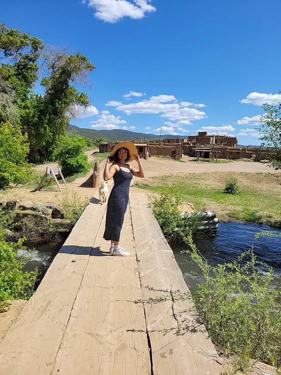 Taos Pueblo — Riya on a bridge.