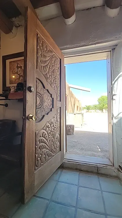 Taos Pueblo — Wooden door.