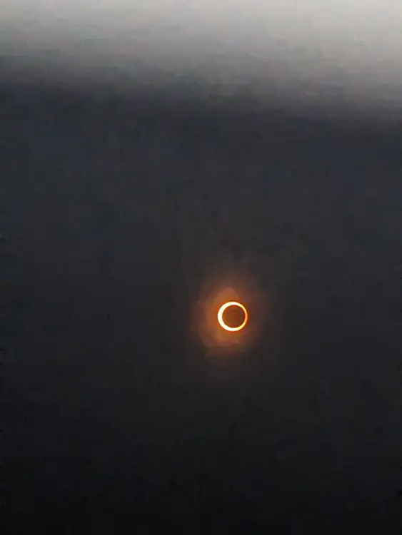 Annular eclipse, captured with Riya's phone.