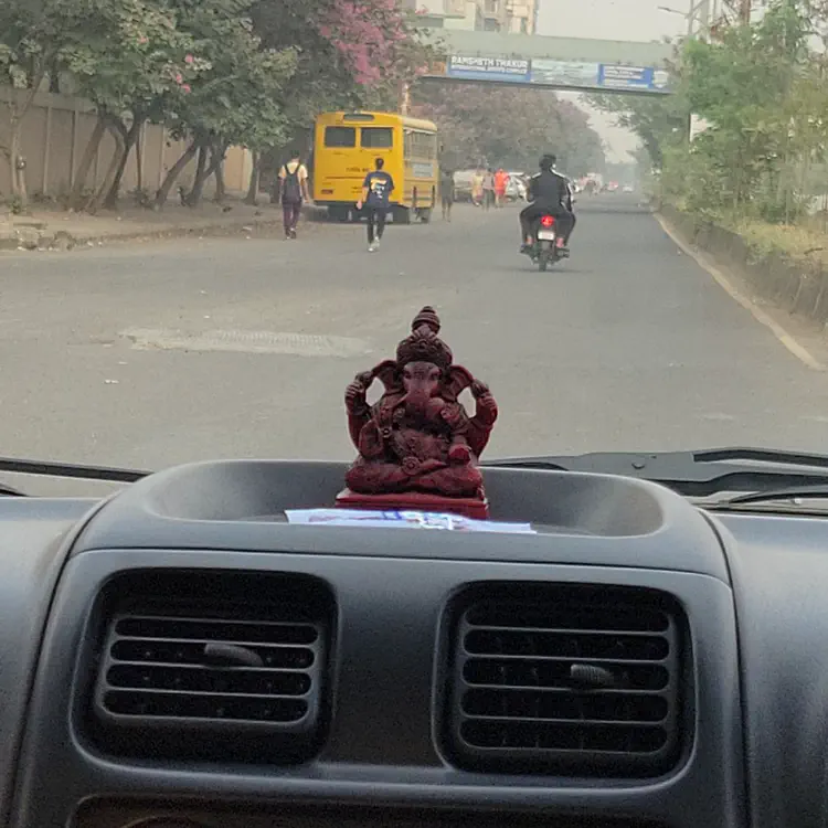 Ganesha on the car dash.