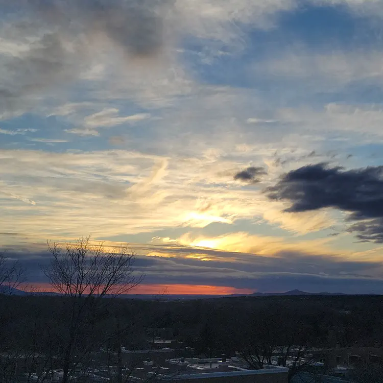 Sunset, clouds making the sky look like stained glass.