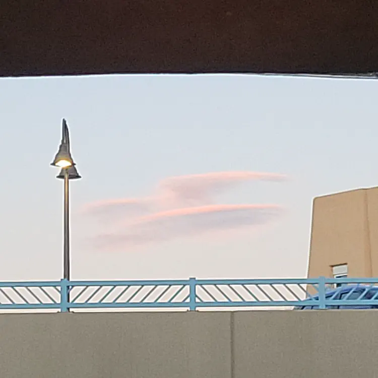 Clouds and parking garage.