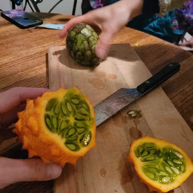 Trying exotic fruits with friends.