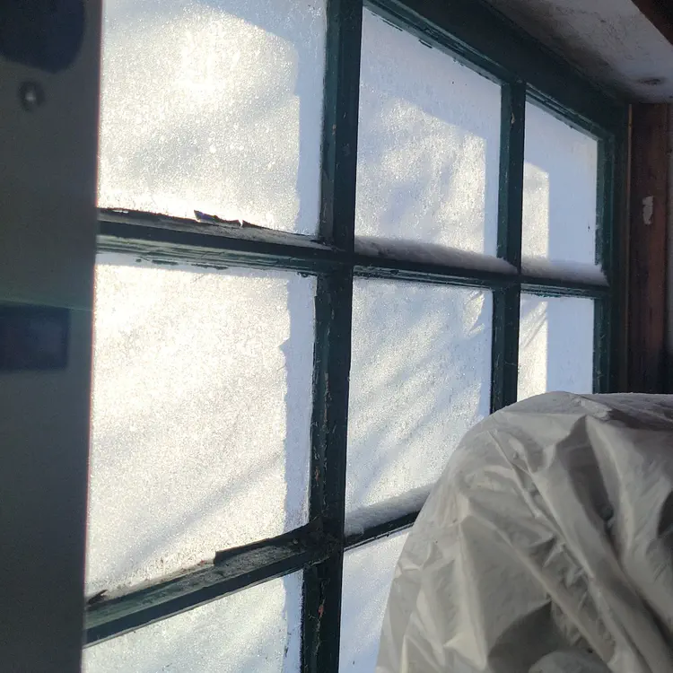 Garage window, light effects on frost.