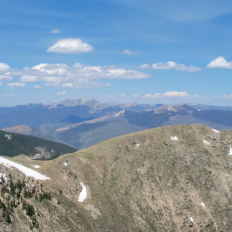 View from Santa Fe Baldy summit. The Sangre de Cristo mountain range goes all the way to Colorado.