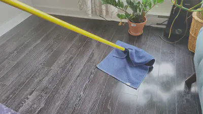 This is how the mop works. The same basic cleaning method is applied, but with a bigger cotton towel at the end of a T-shaped stick.